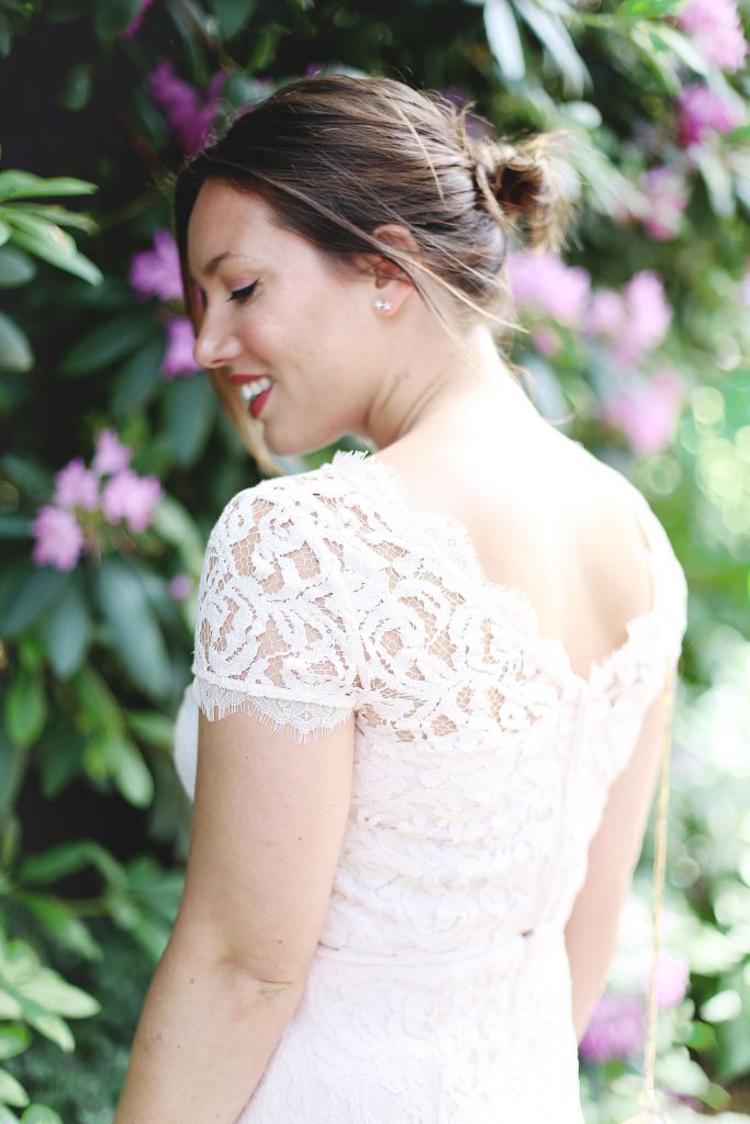 Blush lace wedding guest dress