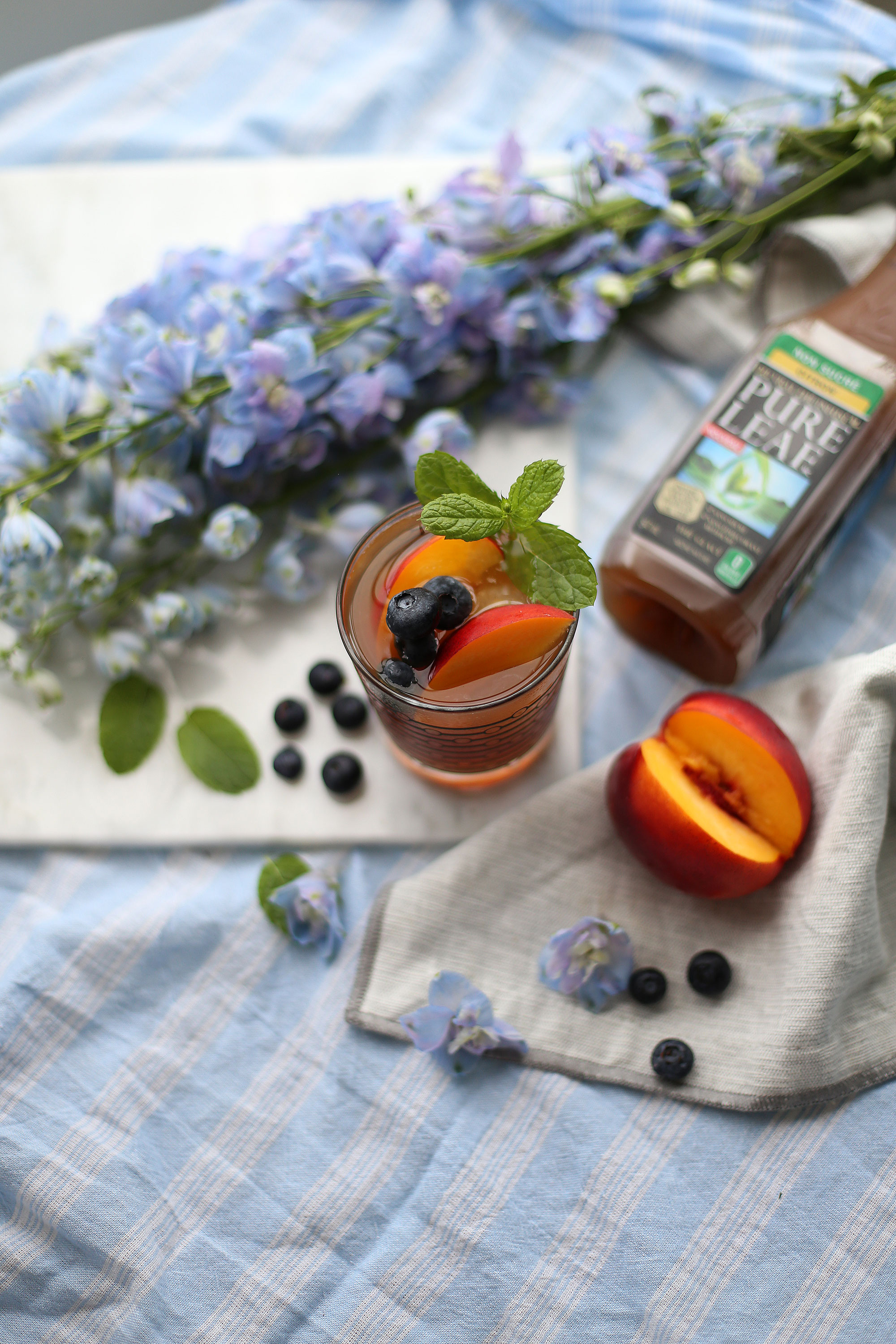 Blueberry peach bourbon cocktail with Pure Leaf Iced Tea