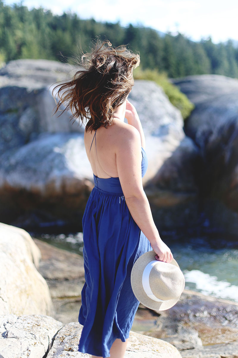 To Vogue or Bust wearing Wilfred by Aritzia dress and straw hat at Lighthouse Park, Vancouver, Canada