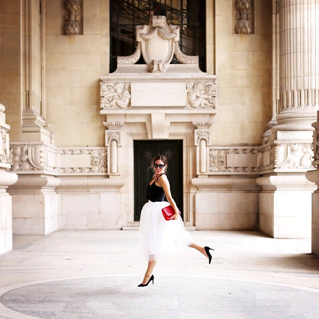 To Vogue or Bust wears a tulle skirt in Grand Palais, Paris