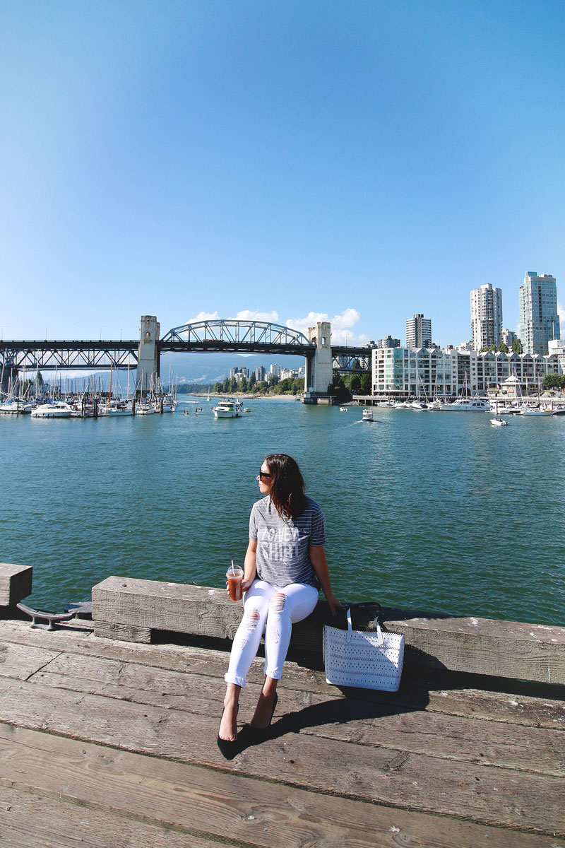 To Vogue or Bust shares tips on thrifting in a Value Village vintage shirt, white skinny James jeans and Express black pumps.