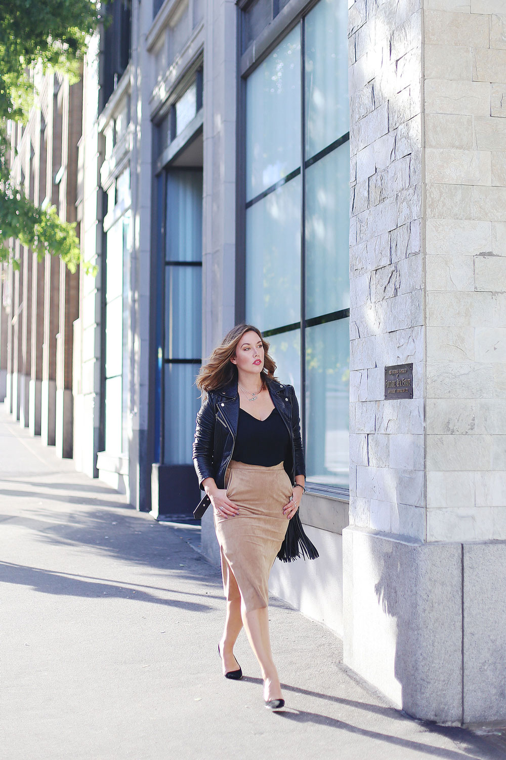 How to layer jewelry in Swarovski jewelry, Aritzia suede pencil skirt, Aritzia black camisole, Mackage leather jacket, Express black heels and Aritzia Wilfred fringe leather bag