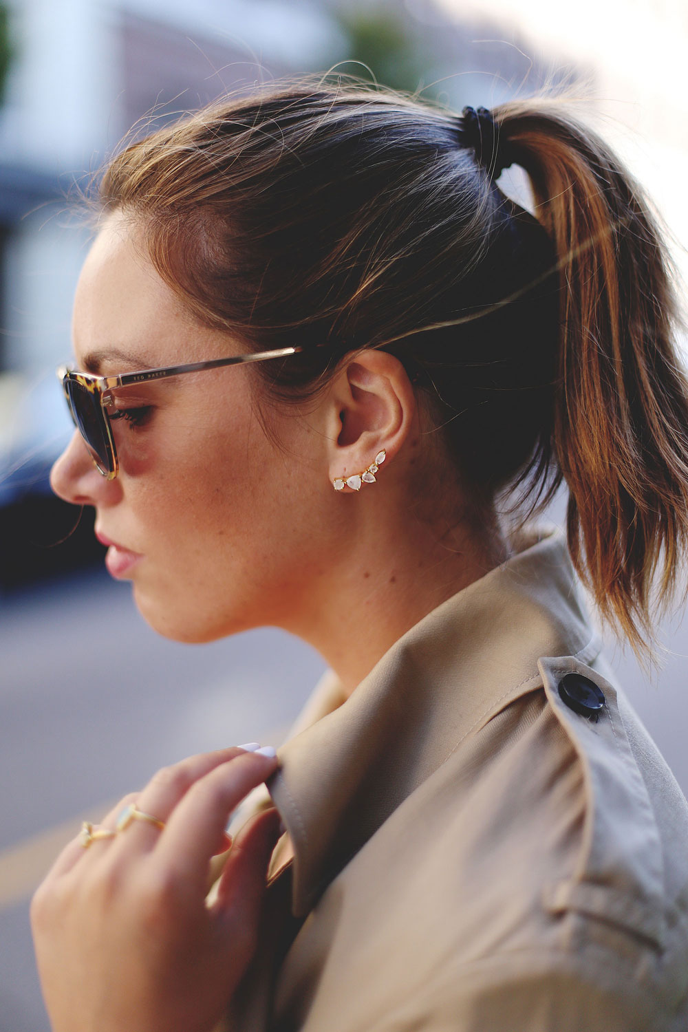 To Vogue or Bust shares fall transition style tips in a REVOLVE TULAROSA romper, Aritzia Wilfred trench coat, Aritzia Auxiliary Bega bag, Joie heels, Leah Alexandra jewelry and Ted Baker sunglasses