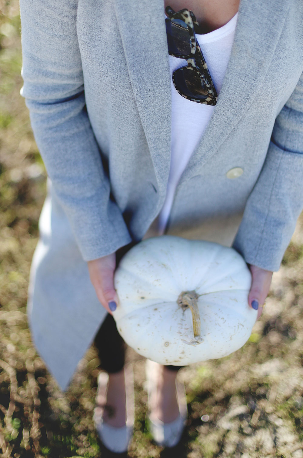 To Vogue or Bust shares details about the Tsawwassen Mills grand opening in the best pumpkin patch in Vancouver Backroads Family Market dressed in an Aritzia wool coat, Aritzia grey hat, Aritzia leather leggings, Aritzia T-shirt and taupe Tieks flats with Leah Alexandra Jewelry