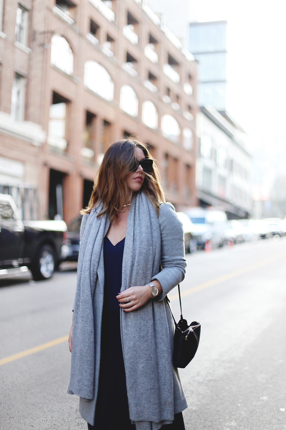 How to wear Converse sneakers with a dress in an Aritzia dress, White + Warren cashmere travel wrap, Converse white sneakers, Celine sunglasses styled by To Vogue or Bust