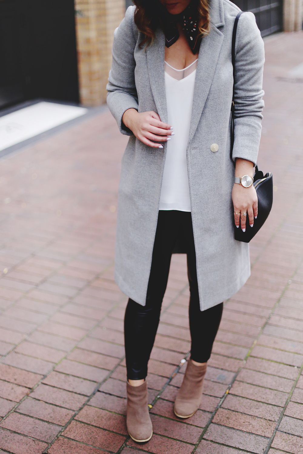 Legging leather outfit tips in Aritzia leather leggings, Aritzia silk camisole, Aritzia wool grey coat, Express tan fedora, Aritzia silk scarf, Aritzia black leather bag, CLUSE mesh silver watch and Urban Outfitters suede ankle boots styled by To Vogue or Bust