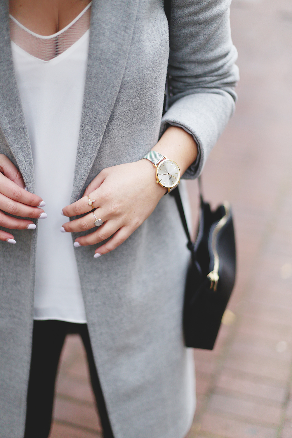 Legging leather outfit tips in Aritzia leather leggings, Aritzia silk camisole, Aritzia wool grey coat, Express tan fedora, Aritzia silk scarf, Aritzia black leather bag, CLUSE mesh silver watch and Urban Outfitters suede ankle boots styled by To Vogue or Bust