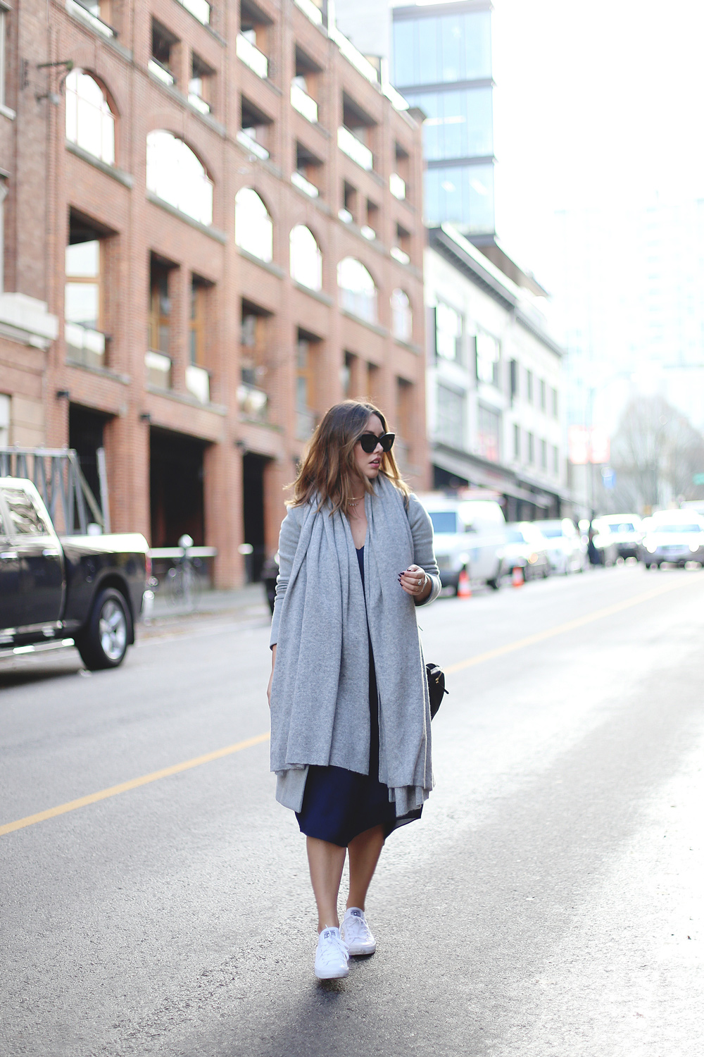 How to wear Converse sneakers with a dress in an Aritzia dress, White + Warren cashmere travel wrap, Converse white sneakers, Celine sunglasses styled by To Vogue or Bust