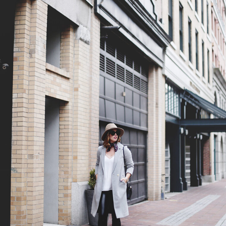 Legging leather outfit tips in Aritzia leather leggings, Aritzia silk camisole, Aritzia wool grey coat, Express tan fedora, Aritzia silk scarf, Aritzia black leather bag, CLUSE mesh silver watch and Urban Outfitters suede ankle boots styled by To Vogue or Bust