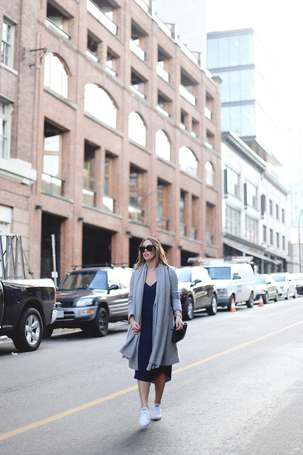 How to wear Converse sneakers with a dress in an Aritzia dress, White + Warren cashmere travel wrap, Converse white sneakers, Celine sunglasses styled by To Vogue or Bust