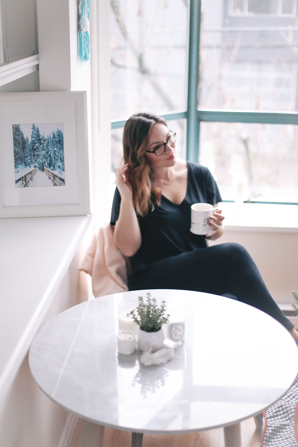 How to decorate small apartments for the holidays with Article Mara marble table, Chanel grey chairs