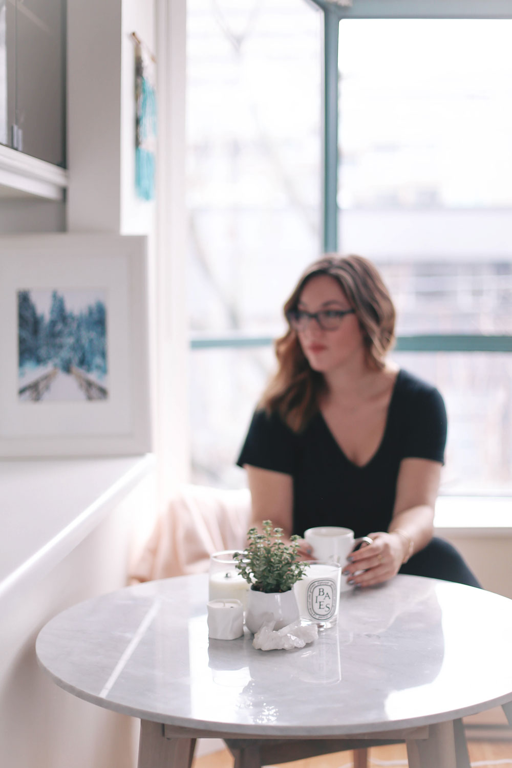 How to decorate small apartments for the holidays with Article Mara marble table, Chanel grey chairs