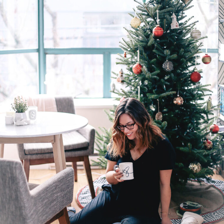 How to decorate small apartments for the holidays with Article Mara marble table, Chanel grey chairs