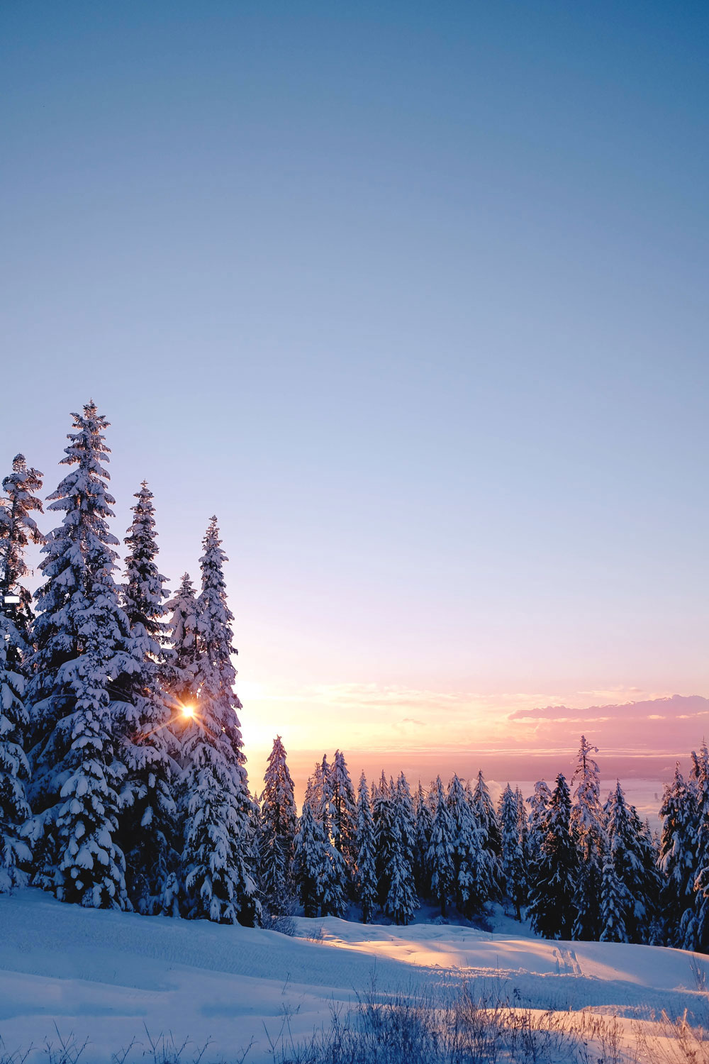 Things to do in Vancouver at Christmas - Grouse Mountain Peak of Christmas ice skating, snowshoeing and skiing