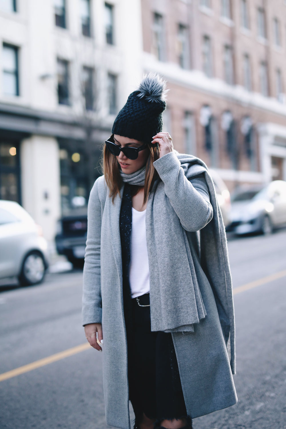 Simple winter outfit idea in Aritzia grey wool coat, White + Warren cashmere coatigan, White + Warren cashmere travel wrap, Express beanie, Frye Chelsea ankle boots, Mavi skinny jeans styled by To Vogue or Bust