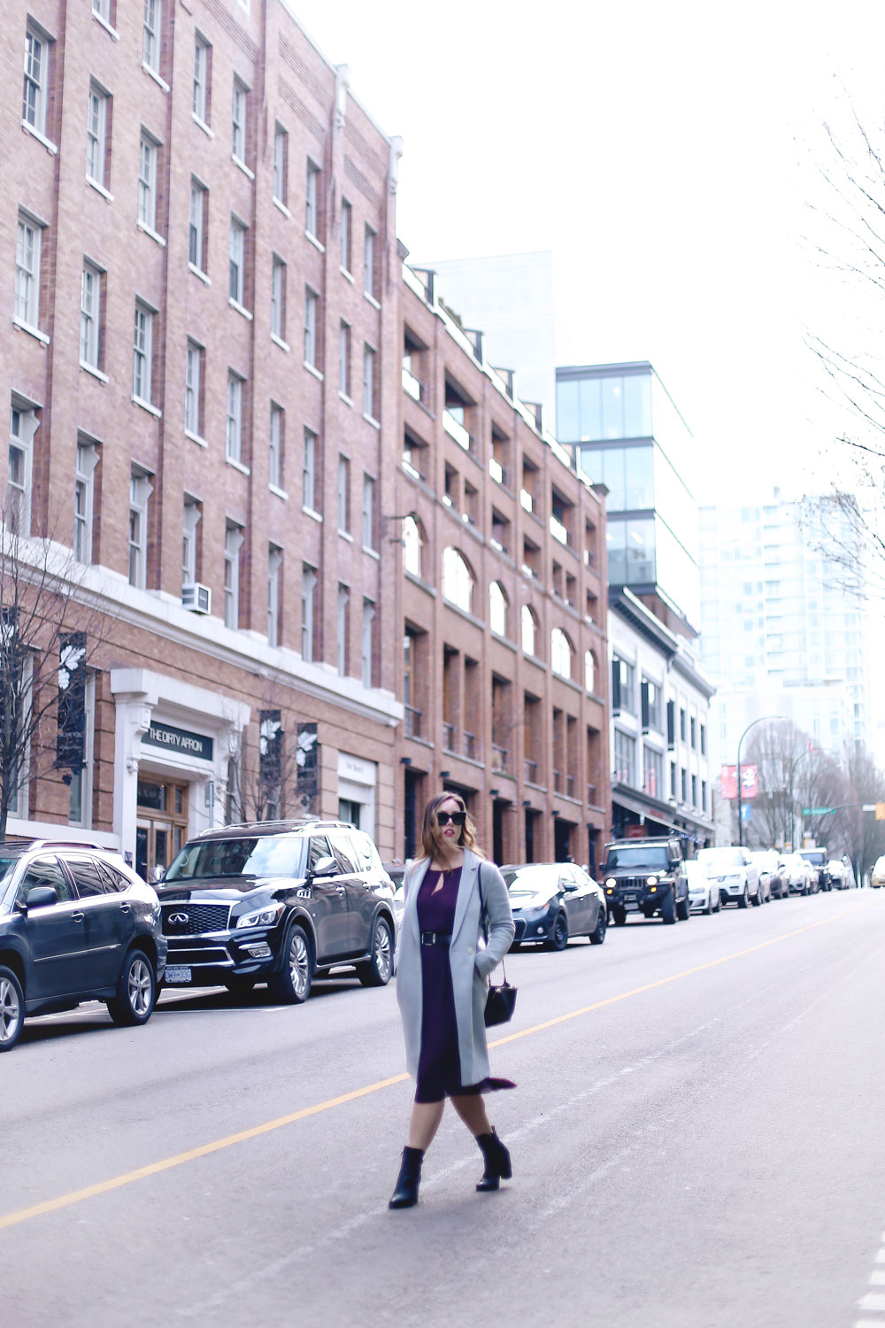 How to transition your style from winter into spring in an Aritzia dress, Aritzia wool coat, Aritzia black leather bag, Frye ankle boots