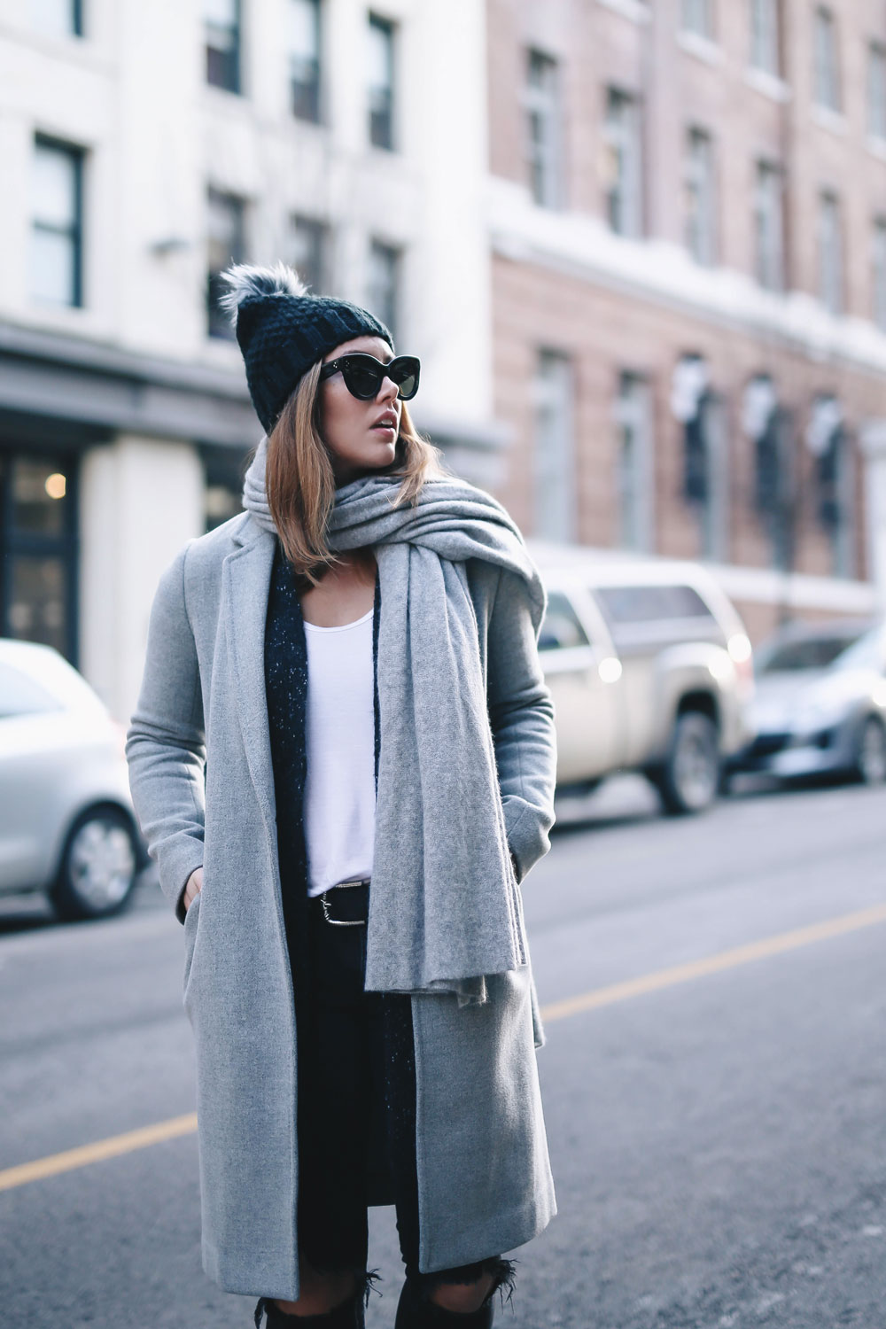 Simple winter outfit idea in Aritzia grey wool coat, White + Warren cashmere coatigan, White + Warren cashmere travel wrap, Express beanie, Frye Chelsea ankle boots, Mavi skinny jeans styled by To Vogue or Bust