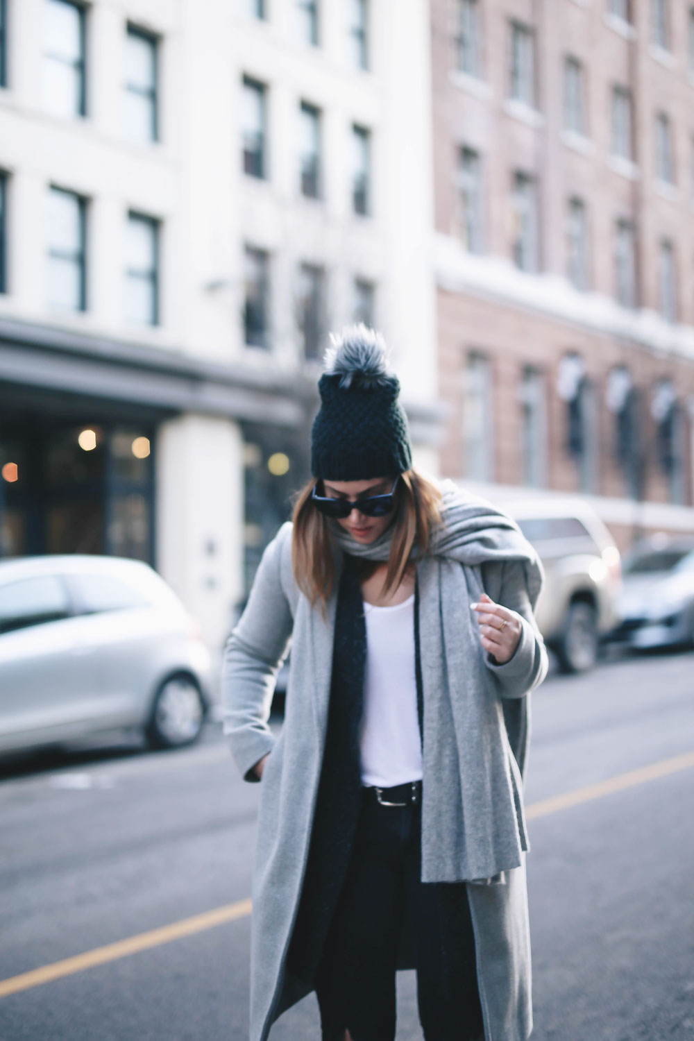 Simple winter outfit idea in Aritzia grey wool coat, White + Warren cashmere coatigan, White + Warren cashmere travel wrap, Express beanie, Frye Chelsea ankle boots, Mavi skinny jeans styled by To Vogue or Bust