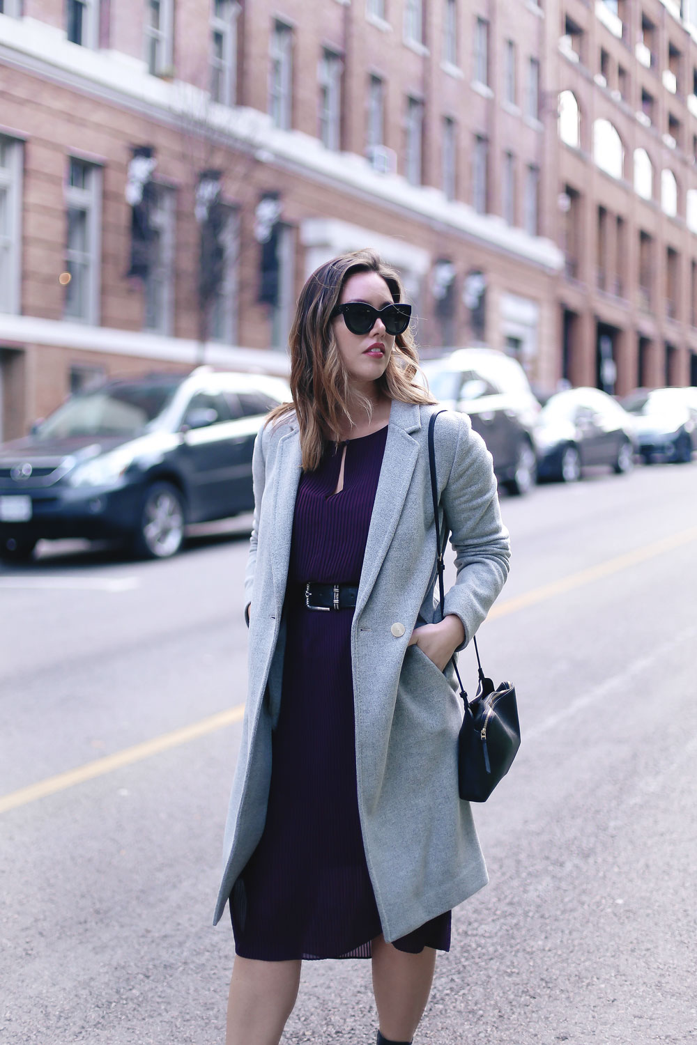 How to transition your style from winter into spring in an Aritzia dress, Aritzia wool coat, Aritzia black leather bag, Frye ankle boots