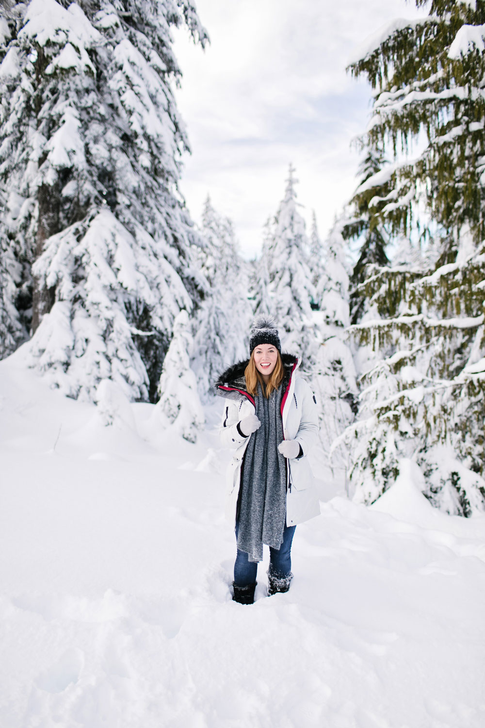 What to wear in the snow in Vancouver, with Noize parka, Express pom pom beanie, Sorel boots, White and Warren cashmere travel wrap and Aritzia mittens styled by To Vogue or Bust