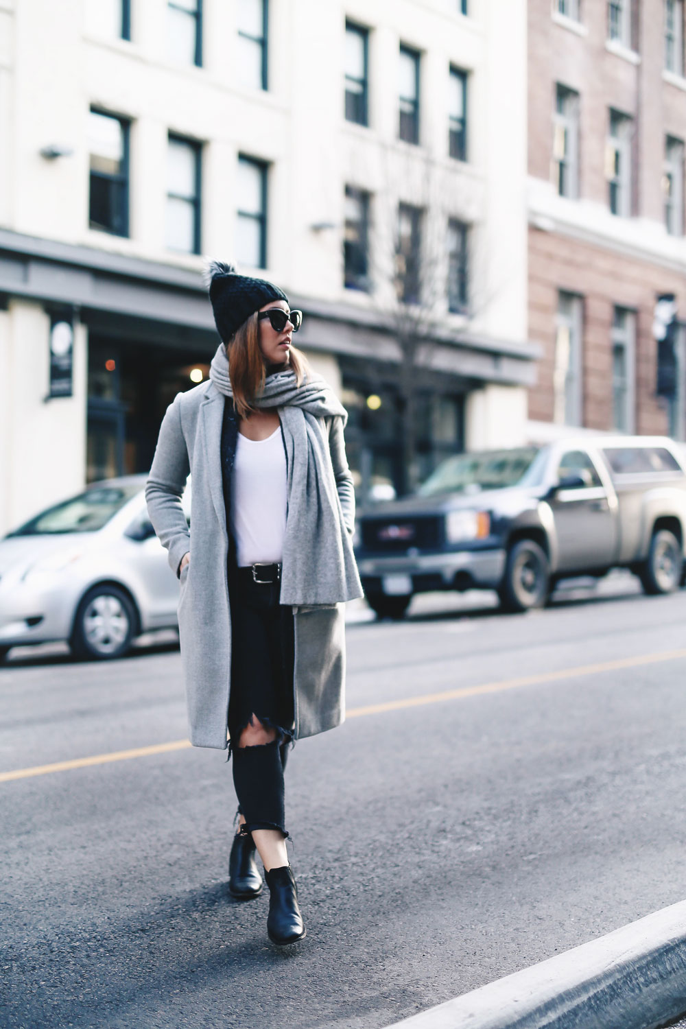Simple winter outfit idea in Aritzia grey wool coat, White + Warren cashmere coatigan, White + Warren cashmere travel wrap, Express beanie, Frye Chelsea ankle boots, Mavi skinny jeans styled by To Vogue or Bust