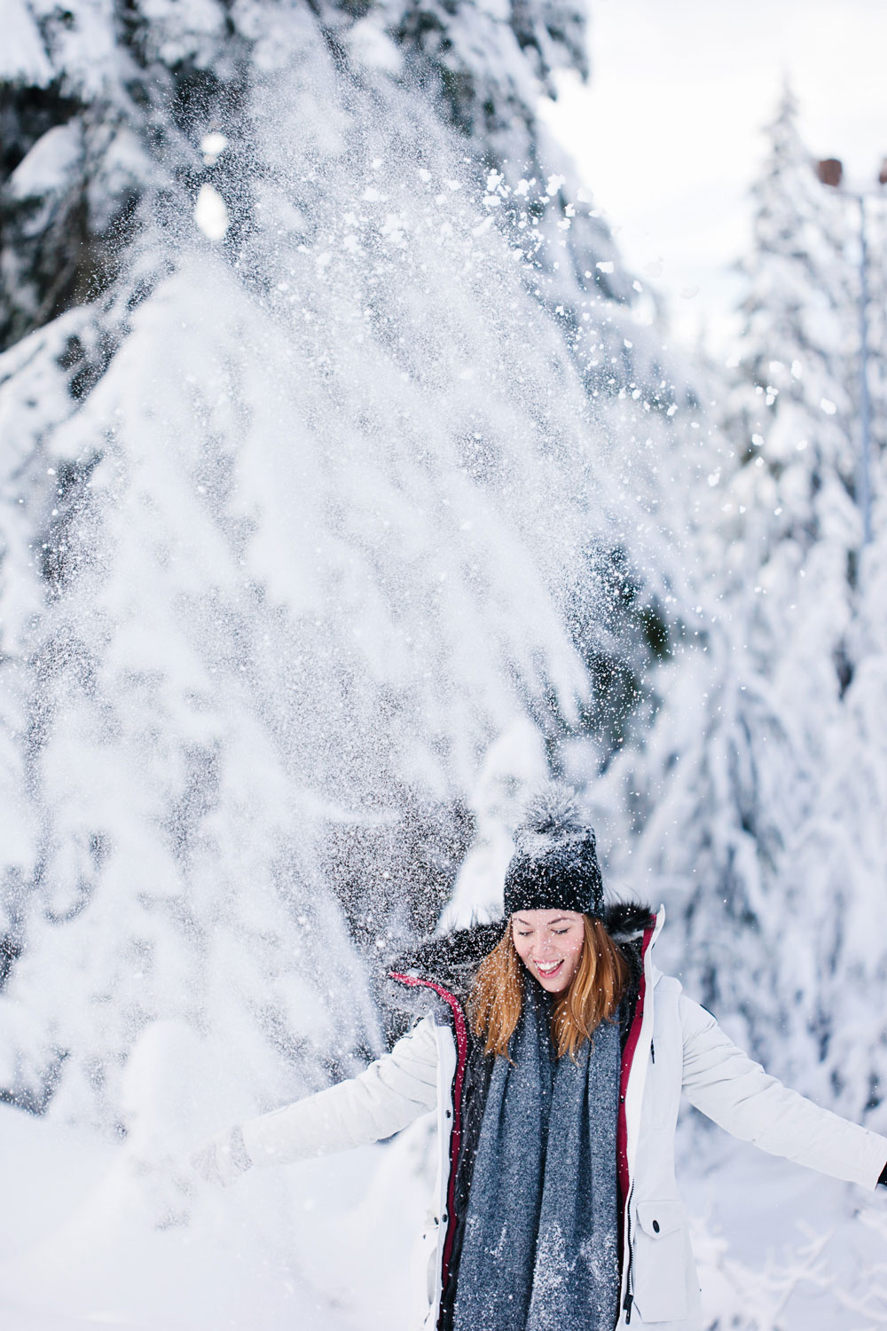 What to wear in the snow in Vancouver, with Noize parka, Express pom pom beanie, Sorel boots, White and Warren cashmere travel wrap and Aritzia mittens styled by To Vogue or Bust