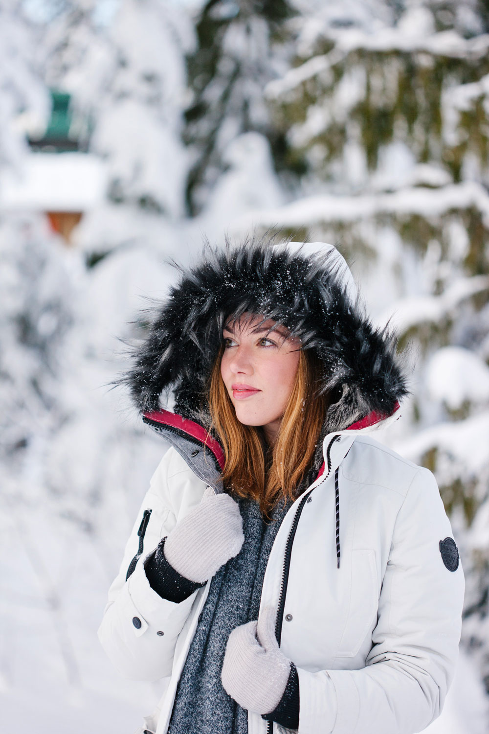 What to wear in the snow in Vancouver, with Noize parka, Express pom pom beanie, Sorel boots, White and Warren cashmere travel wrap and Aritzia mittens styled by To Vogue or Bust