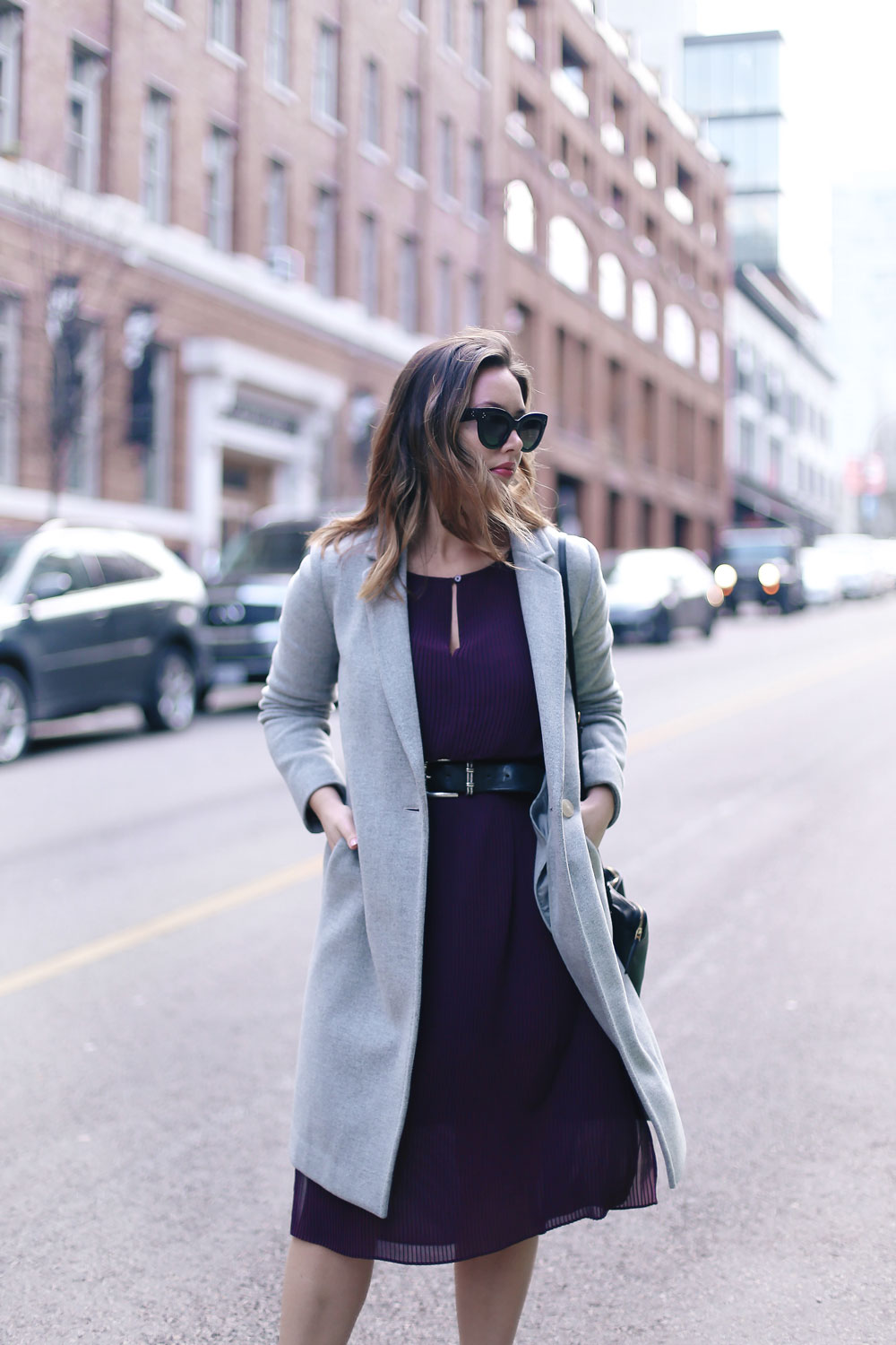 How to transition your style from winter into spring in an Aritzia dress, Aritzia wool coat, Aritzia black leather bag, Frye ankle boots