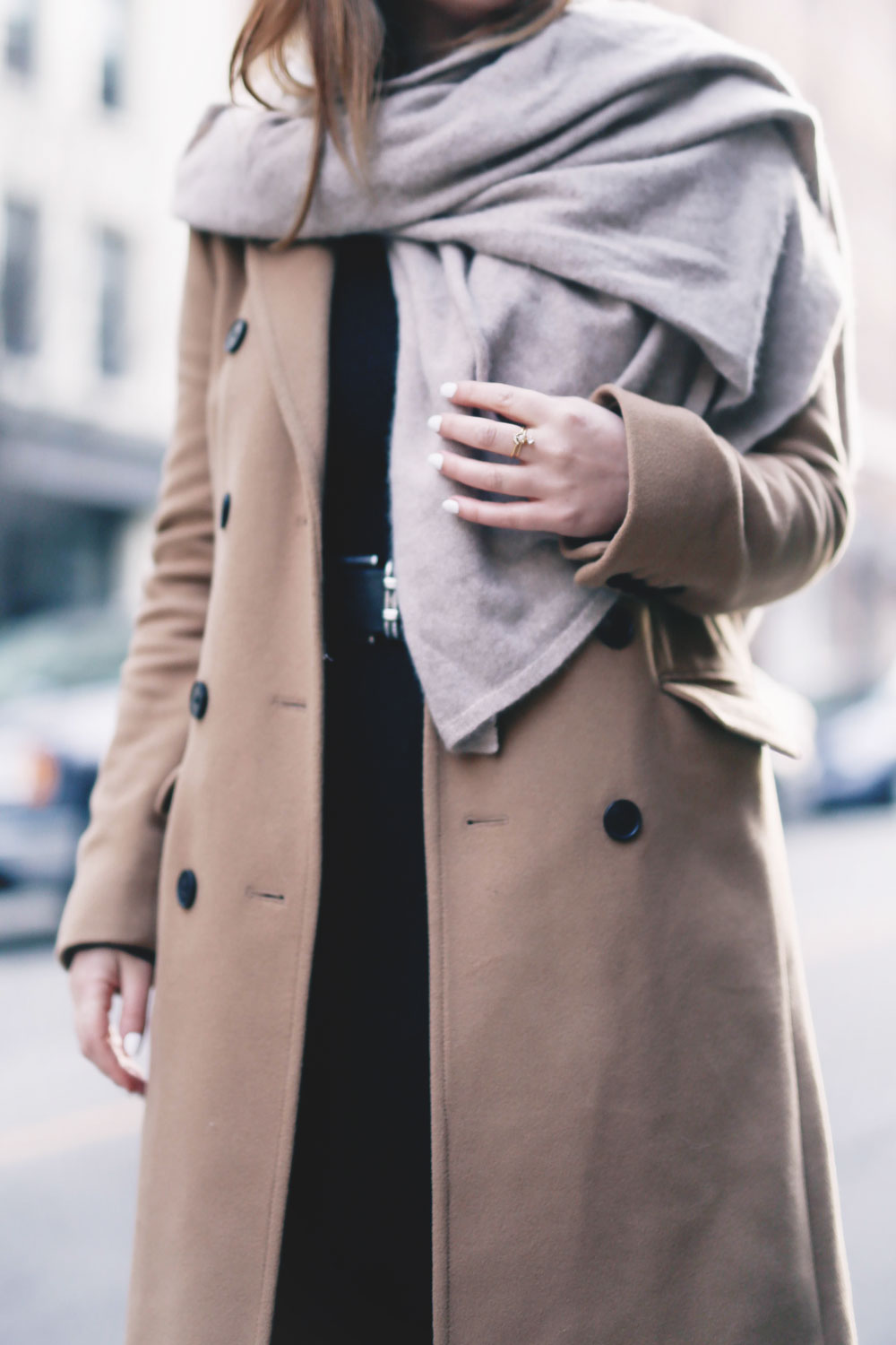 Tips on wearing a dress in the winter styled by To Vogue or Bust in an Aritzia camel wool coat, White and Warren cashmere dress, White and Warren cashmere travel wrap, Frye ankle boots, Express beanie hat and Celine Caty sunglasses