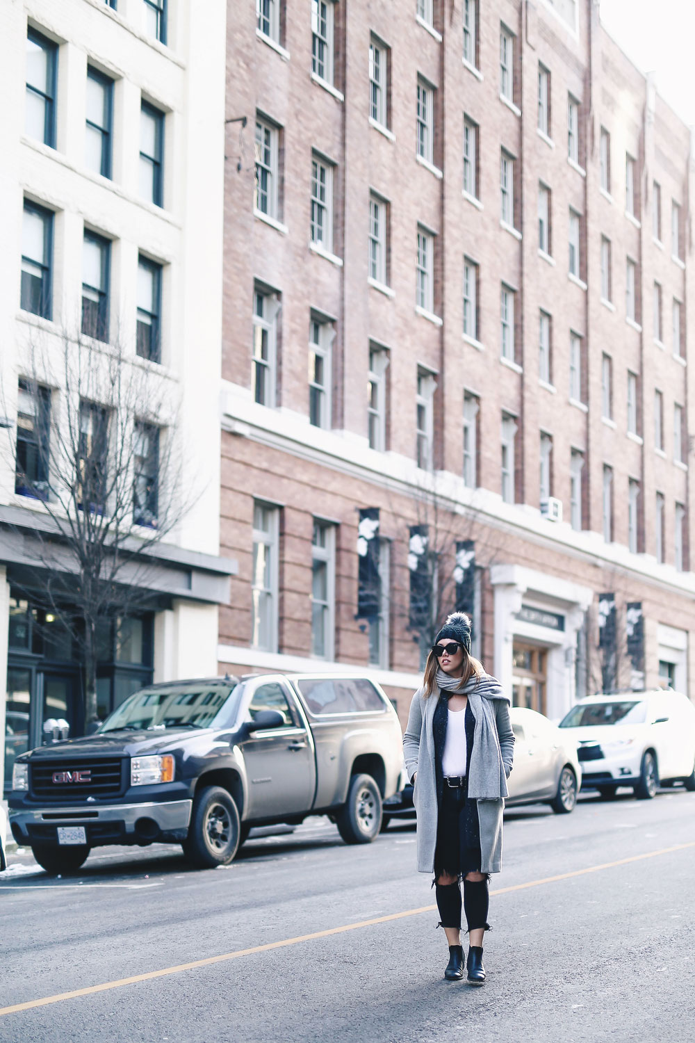 Simple winter outfit idea in Aritzia grey wool coat, White + Warren cashmere coatigan, White + Warren cashmere travel wrap, Express beanie, Frye Chelsea ankle boots, Mavi skinny jeans styled by To Vogue or Bust