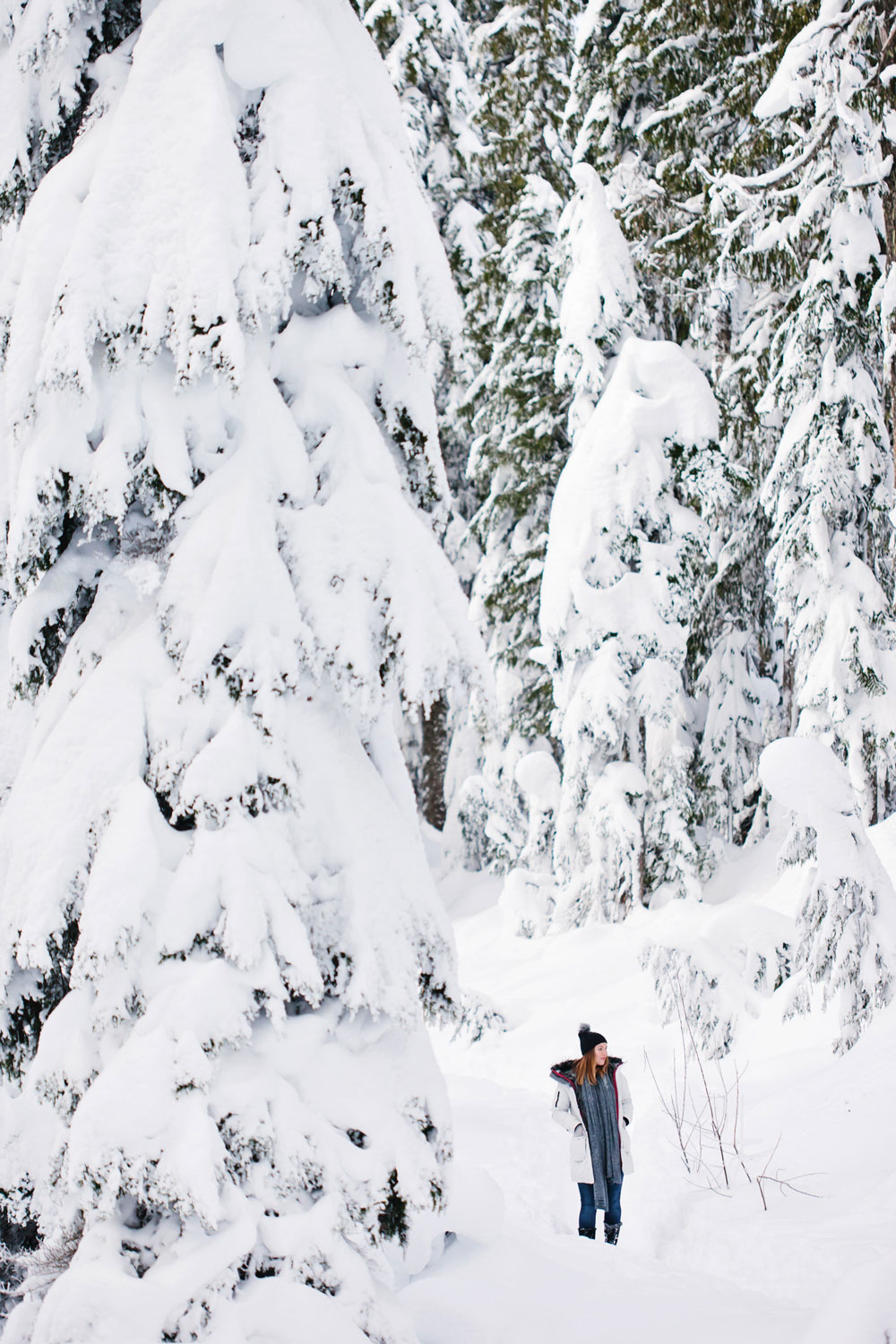 What to wear in the snow in Vancouver, with Noize parka, Express pom pom beanie, Sorel boots, White and Warren cashmere travel wrap and Aritzia mittens styled by To Vogue or Bust