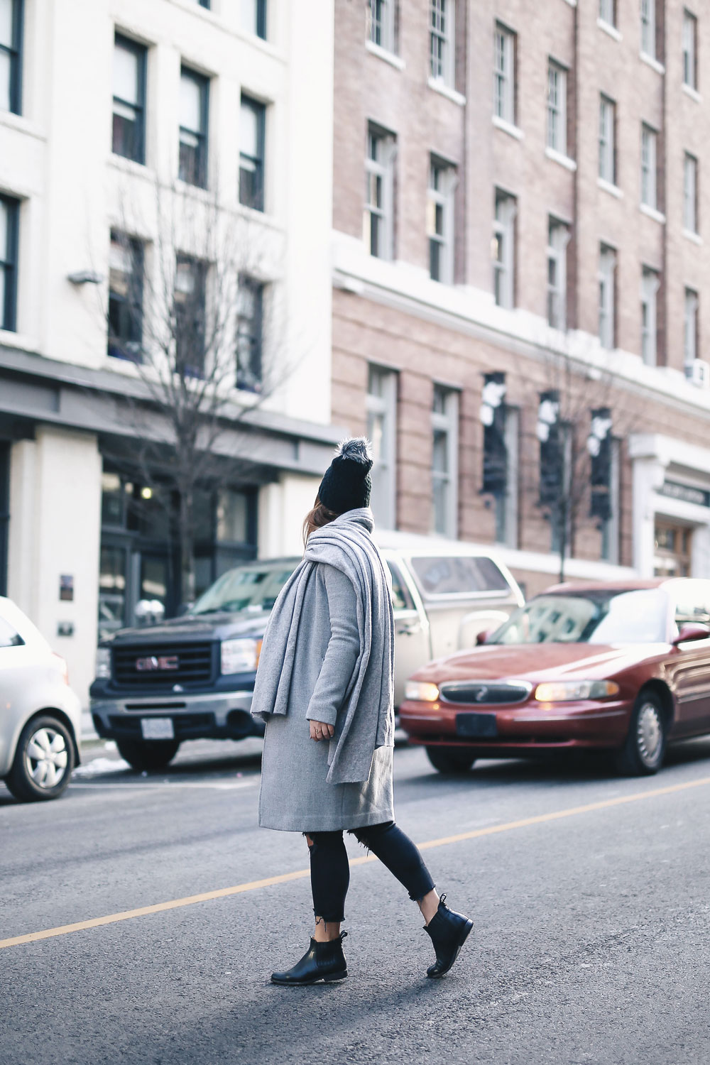 Simple winter outfit idea in Aritzia grey wool coat, White + Warren cashmere coatigan, White + Warren cashmere travel wrap, Express beanie, Frye Chelsea ankle boots, Mavi skinny jeans styled by To Vogue or Bust