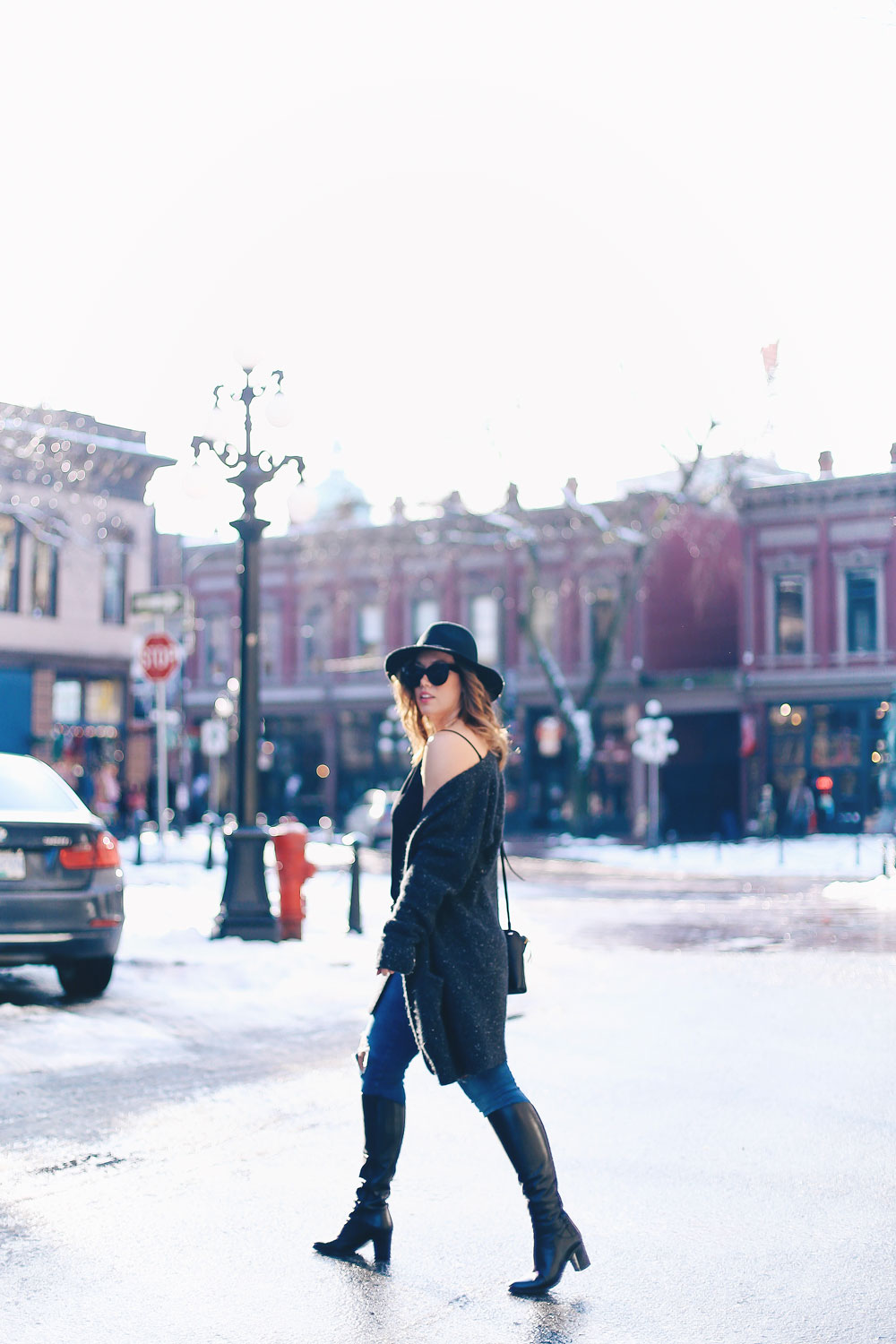 How to wear off the shoulder sweaters in White + Warren cashmere coatigan, Mavi skinny jeans, La Canadienne boots, Aritzia camisole, Express fedora, Leah Alexandra jewelry styled by To Vogue or Bust