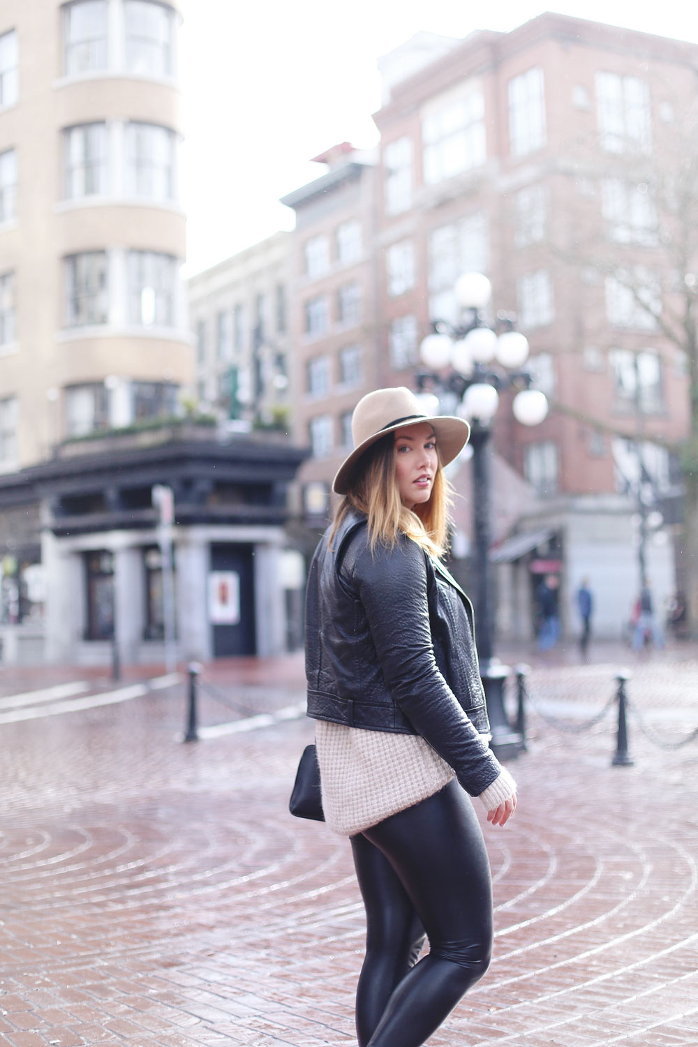 Rainy day outfits ideas in Roma boots, Mackage leather jacket, Express fedora, Aritzia sweater, Aritzia leather leggings styled by To Vogue or Bust 