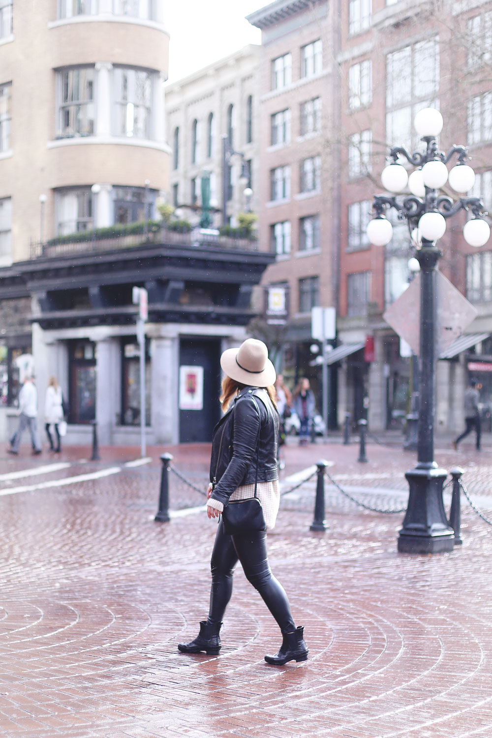 Rainy day outfits ideas in Roma boots, Mackage leather jacket, Express fedora, Aritzia sweater, Aritzia leather leggings styled by To Vogue or Bust 