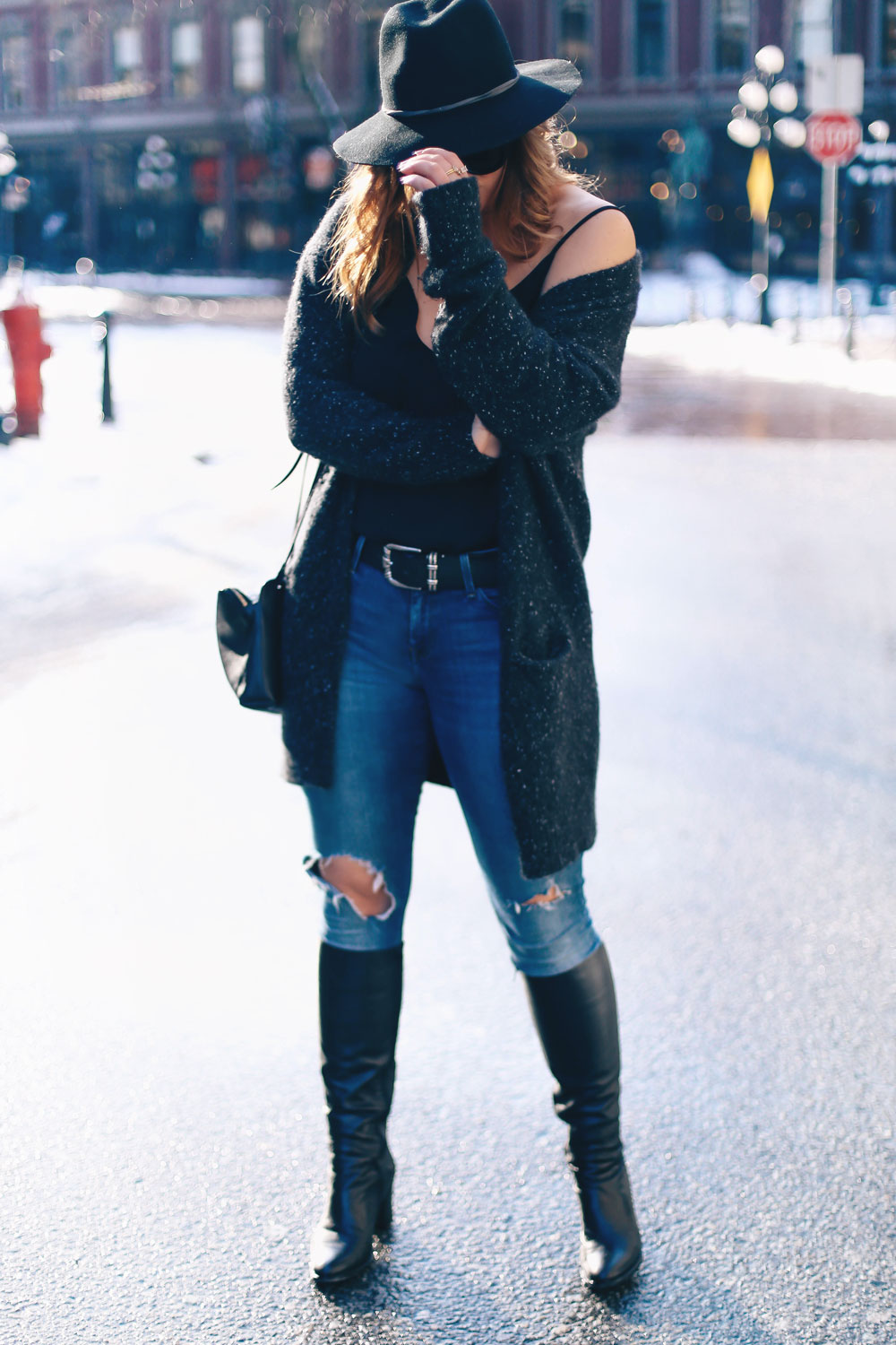 How to wear off the shoulder sweaters in White + Warren cashmere coatigan, Mavi skinny jeans, La Canadienne boots, Aritzia camisole, Express fedora, Leah Alexandra jewelry styled by To Vogue or Bust