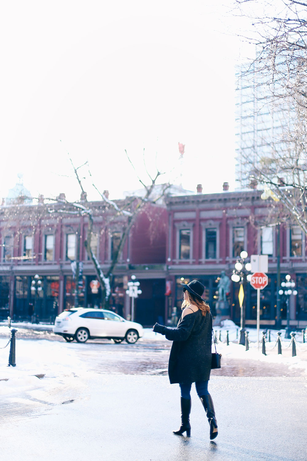 How to wear off the shoulder sweaters in White + Warren cashmere coatigan, Mavi skinny jeans, La Canadienne boots, Aritzia camisole, Express fedora, Leah Alexandra jewelry styled by To Vogue or Bust