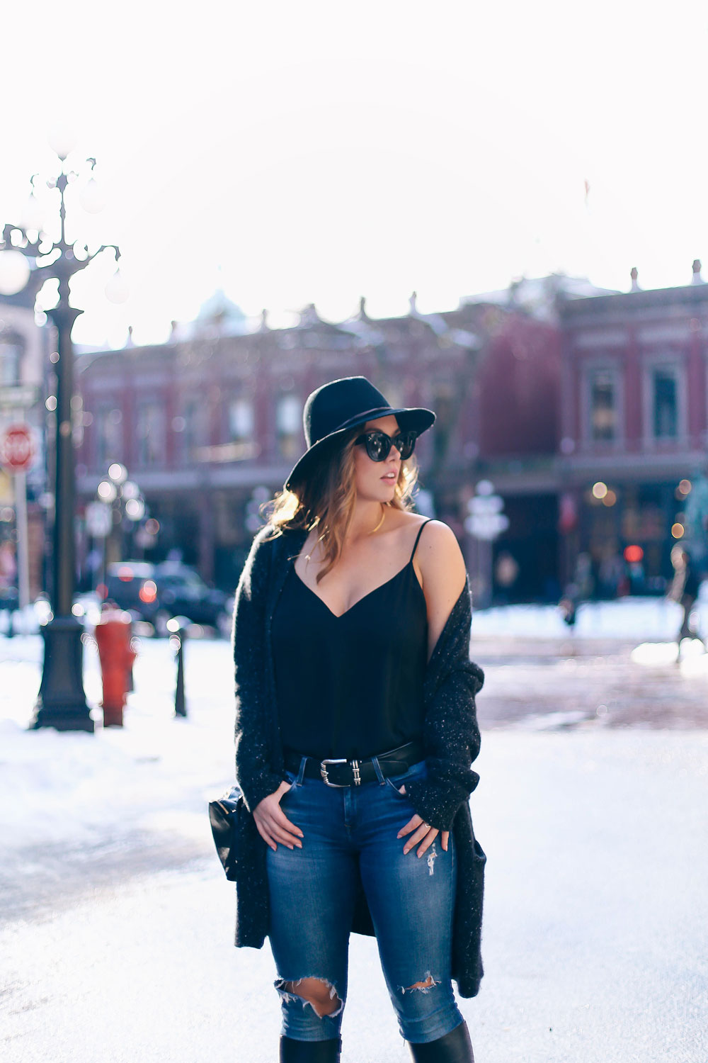 How to wear off the shoulder sweaters in White + Warren cashmere coatigan, Mavi skinny jeans, La Canadienne boots, Aritzia camisole, Express fedora, Leah Alexandra jewelry styled by To Vogue or Bust