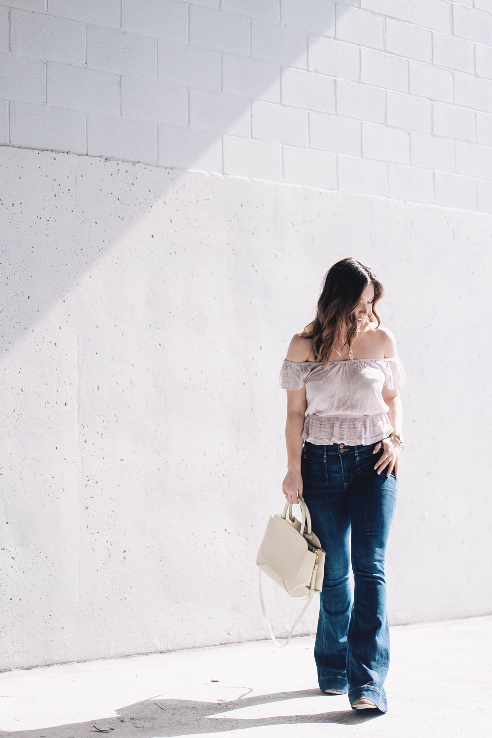 How to wear ruffles, Spring 2017 fashion trends, how to wear off the shoulder tops, Aritzia top, Express flare jeans, how to wear flare jeans by To Vogue or Bust