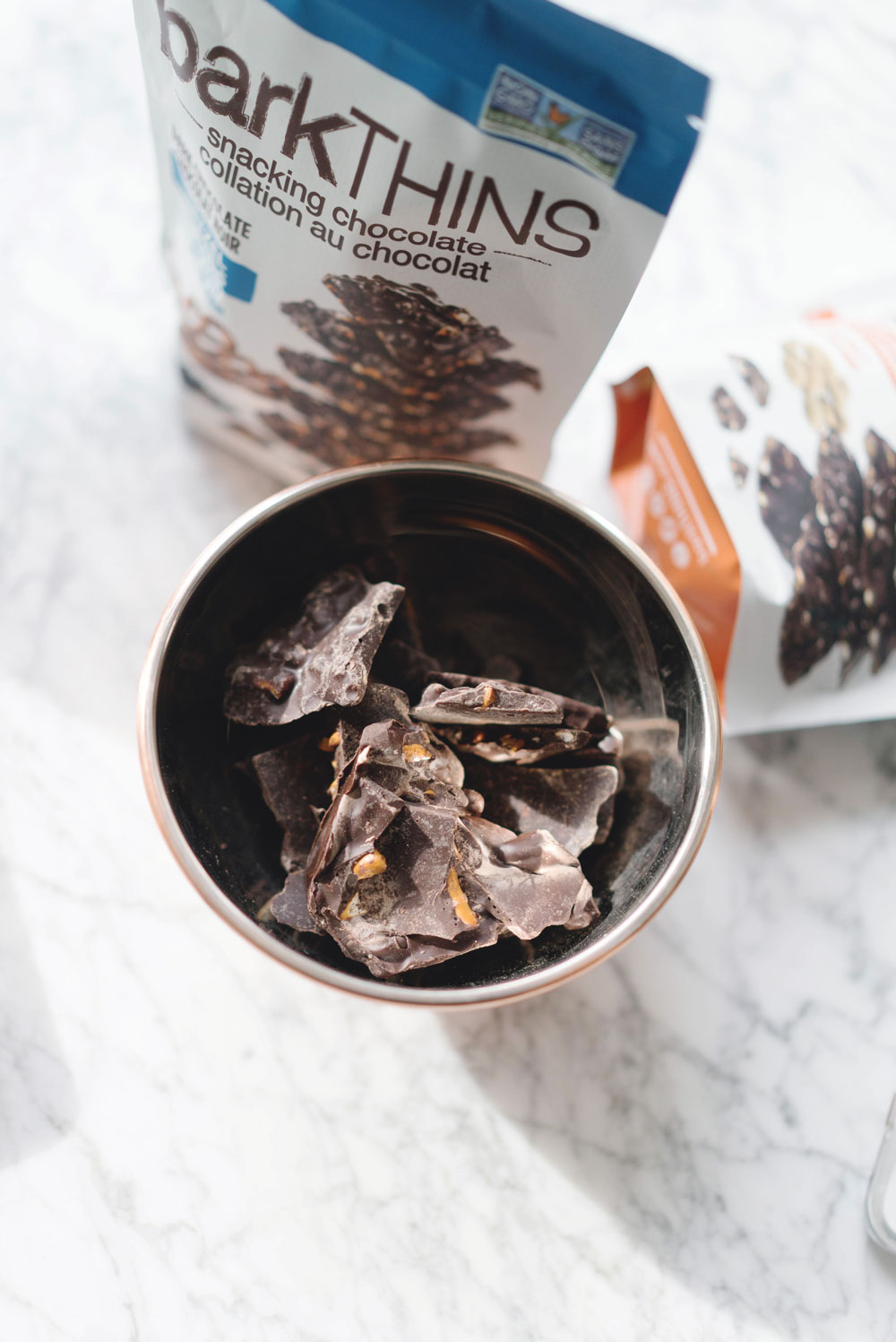 Best dark chocolate snacks, barkTHINS, betterwithbarkTHINS, snackingelevated, pumpkin seed barkTHINS, pretzel with sea salt barkTHINS, almond with sea salt barkTHINS, best snacks by To Vogue or Bust