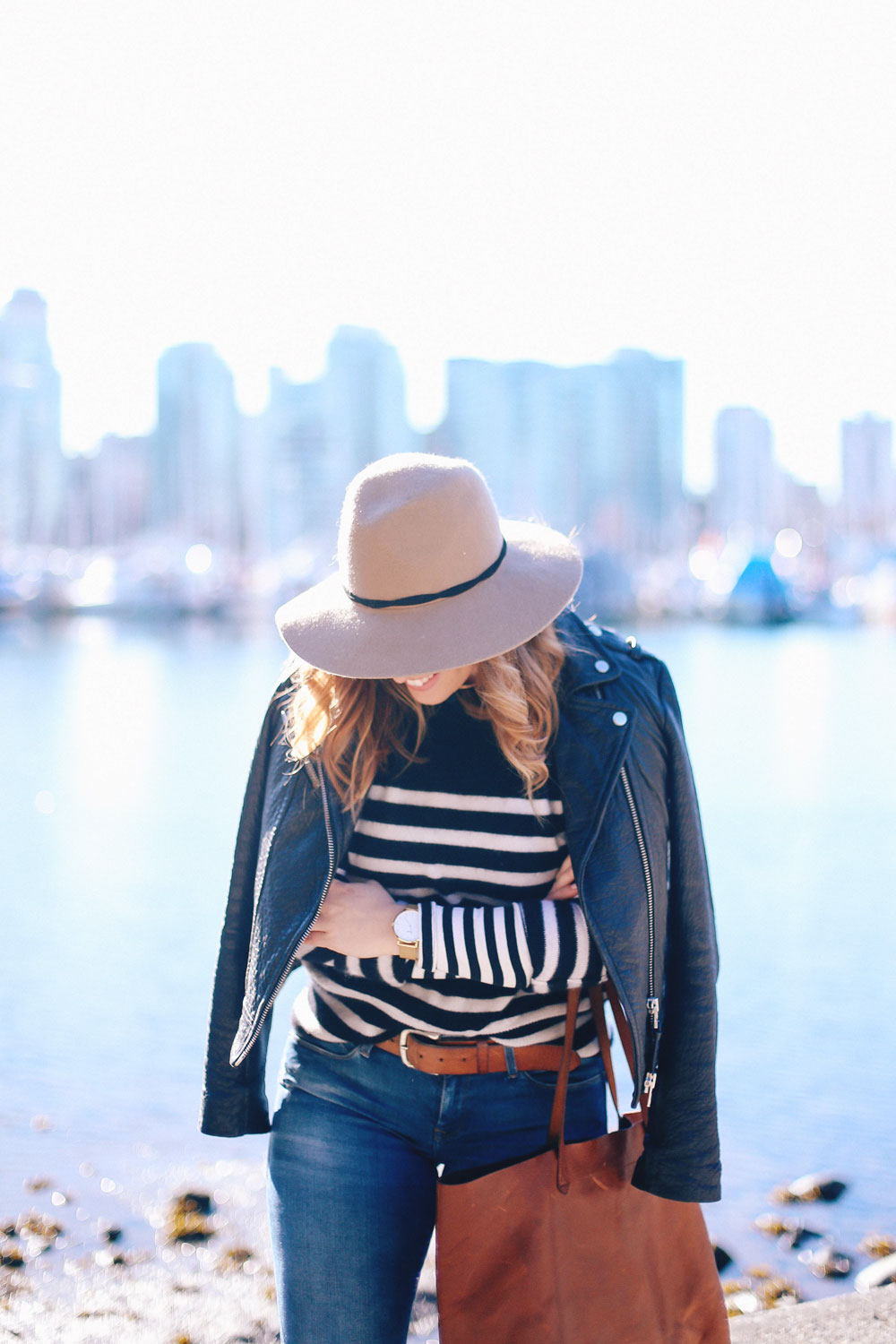 Spring 2017 style trends, how to wear stripes, how to wear ankle boots, in Mavi skinny jeans, Express fedora hat, White Warren cashmere sweater, Mackage leather jacket styled by To Vogue or Bust