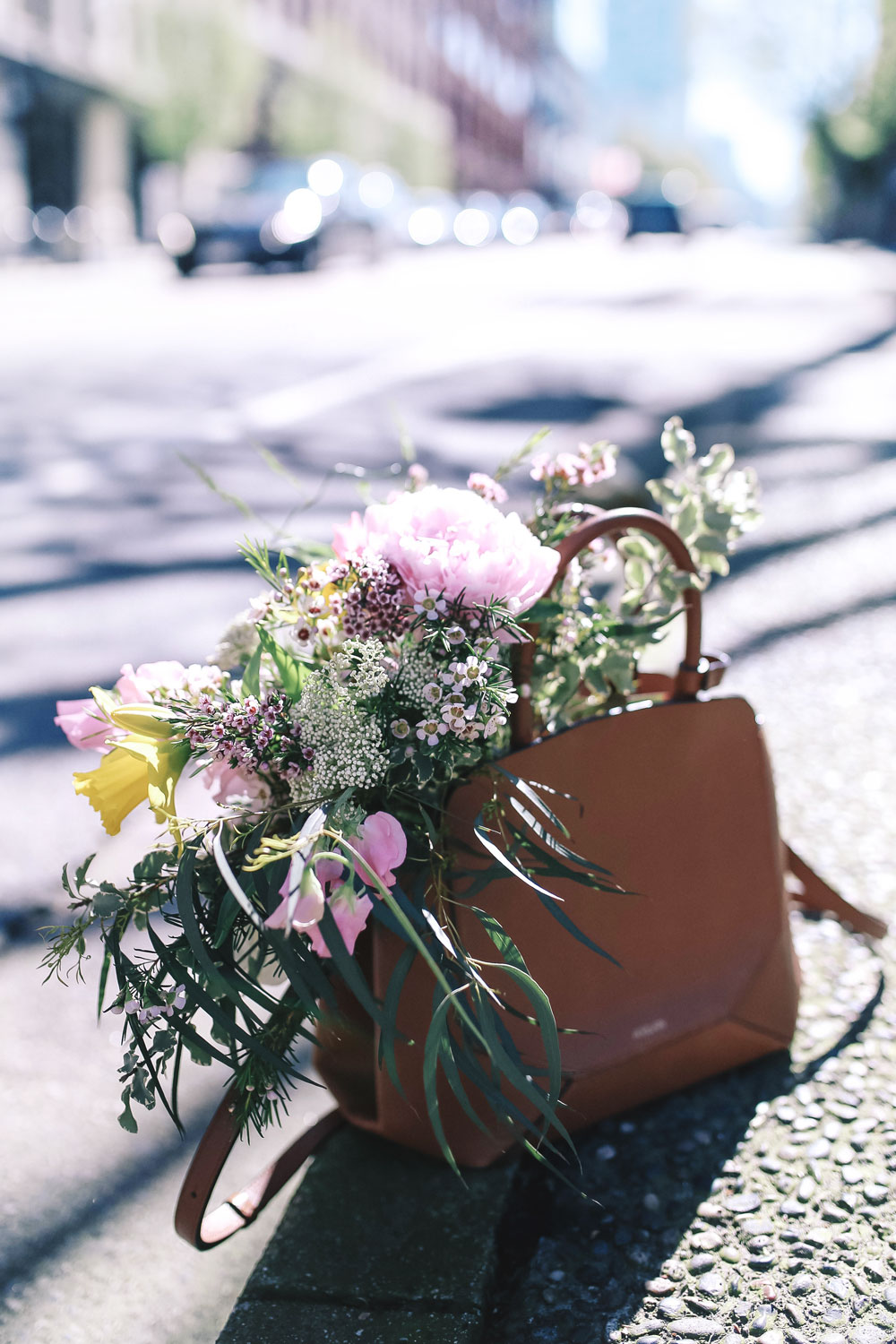 how to wear boyfriend jeans, casual outfit ideas in jcrew heels, mavi t shirt, aritzia auxiliary bag, suede moto jacket outfit ideas, revolve suede jacket, silver jeans boyfriend jeans, casual weekend outfit ideas by To Vogue or Bust