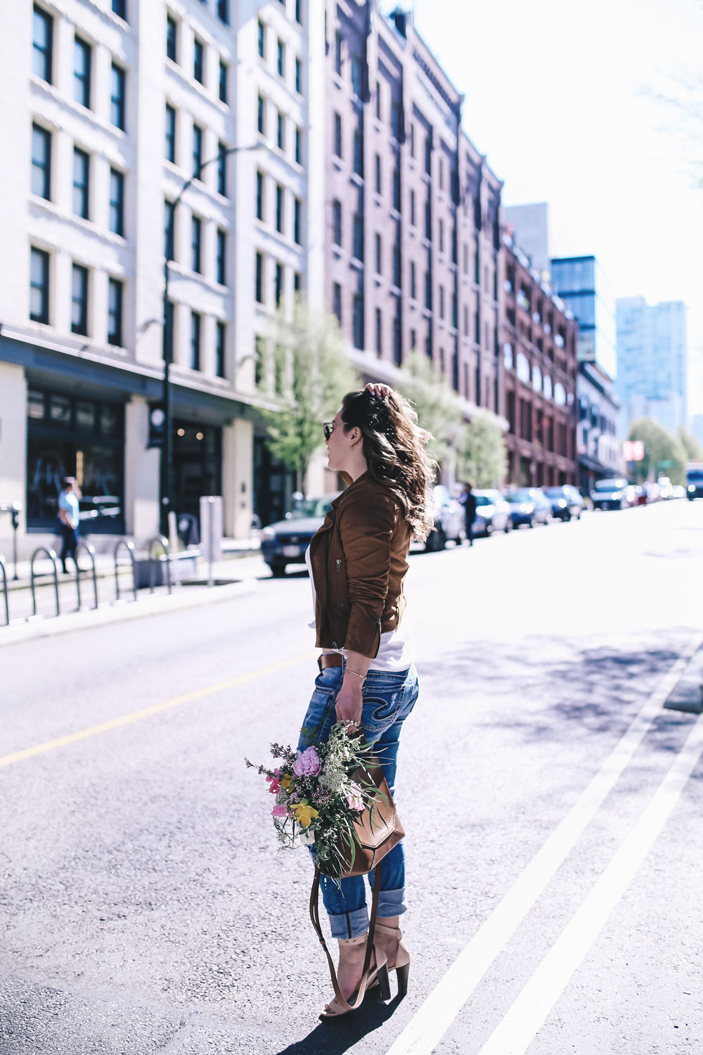 how to wear boyfriend jeans, casual outfit ideas in jcrew heels, mavi t shirt, aritzia auxiliary bag, suede moto jacket outfit ideas, revolve suede jacket, silver jeans boyfriend jeans, casual weekend outfit ideas by To Vogue or Bust