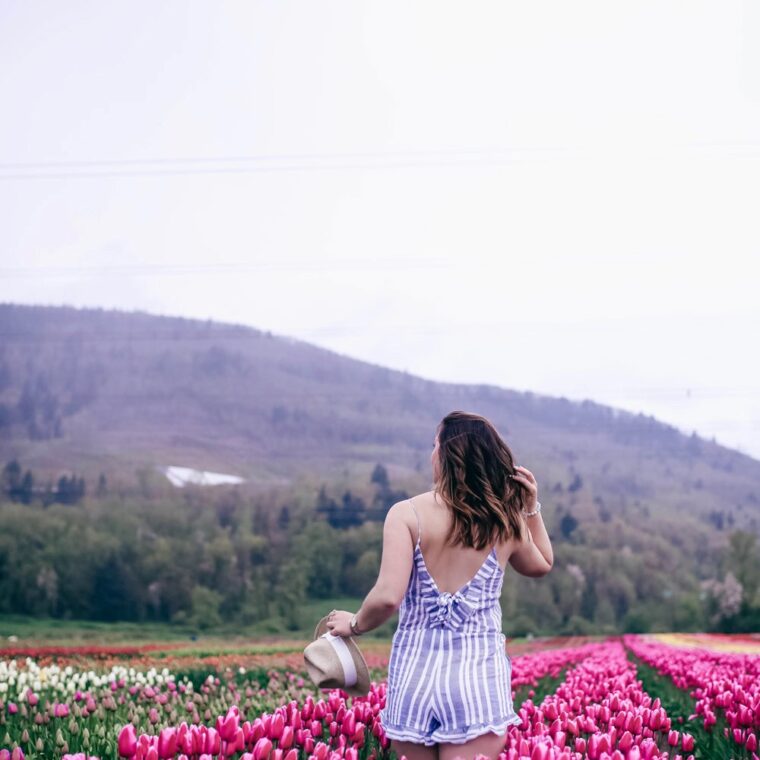 How to transition into summer style, how to wear a romper, how to wear a denim jacket, romper spring style, in aritzia straw hat, cluse watch, lovers friends romper, revolve romper, at abbotsford tulip festival by To Vogue or Bust