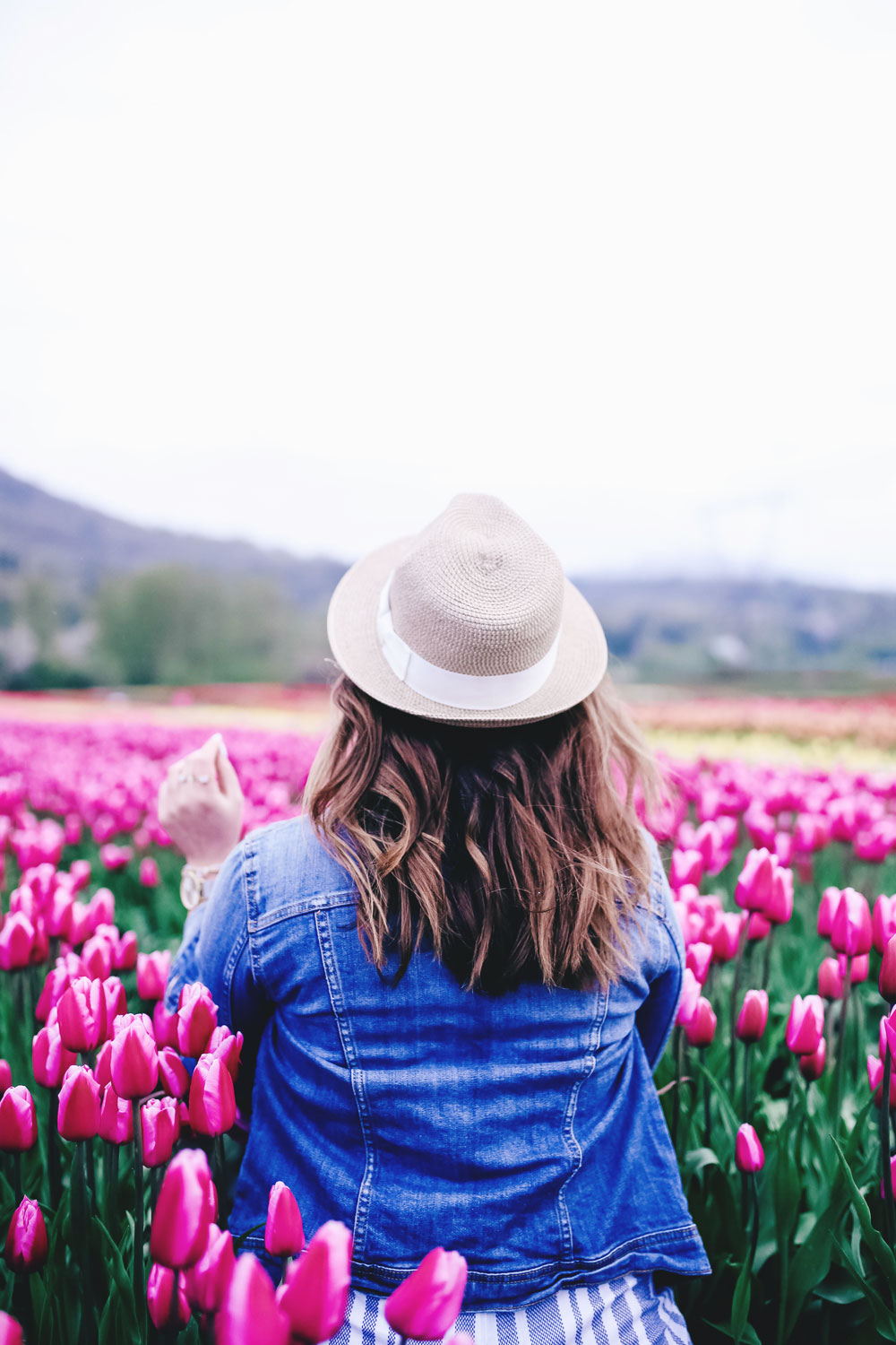 How to transition into summer style, how to wear a romper, how to wear a denim jacket, romper spring style, in aritzia straw hat, cluse watch, lovers friends romper, revolve romper, at abbotsford tulip festival by To Vogue or Bust 