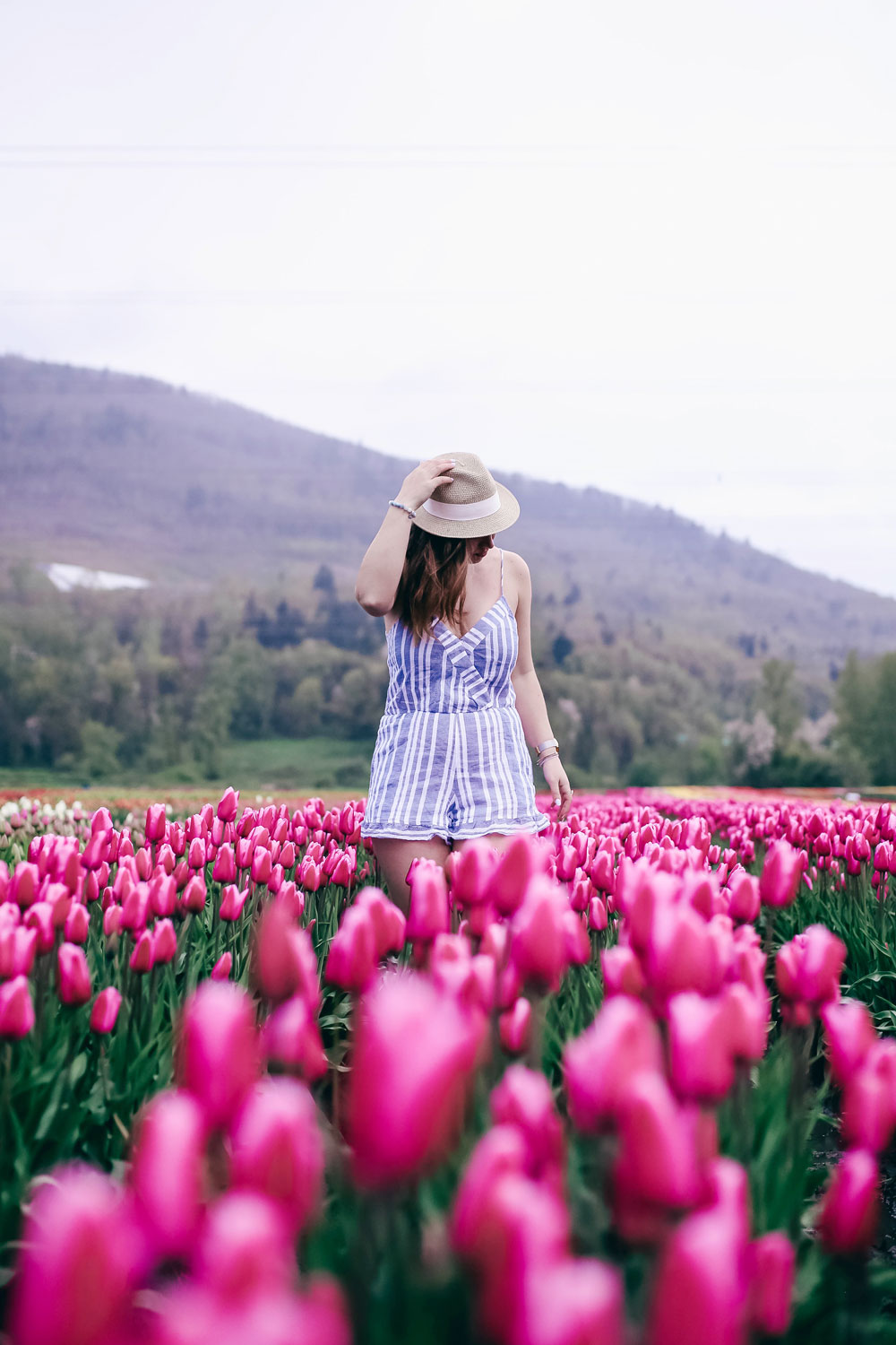 How to transition into summer style, how to wear a romper, how to wear a denim jacket, romper spring style, in aritzia straw hat, cluse watch, lovers friends romper, revolve romper, at abbotsford tulip festival by To Vogue or Bust 
