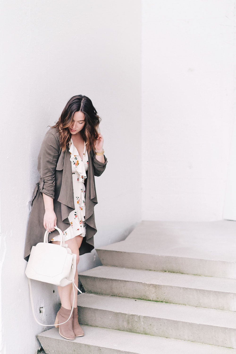 how to wear florals in revolve dress, lovers and friends dress, cluse watch, aritzia bega bag, how to style spring trench coat, how to stack jewelry, floral dress ideas by To Vogue or Bust