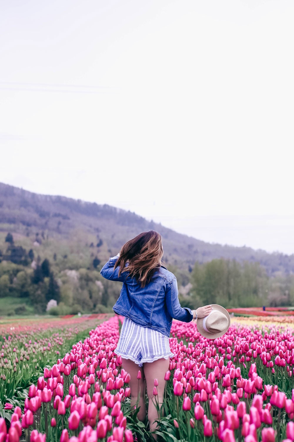 How to transition into summer style, how to wear a romper, how to wear a denim jacket, romper spring style, in aritzia straw hat, cluse watch, lovers friends romper, revolve romper, at abbotsford tulip festival by To Vogue or Bust 