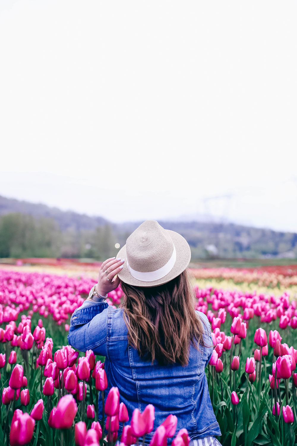 How to transition into summer style, how to wear a romper, how to wear a denim jacket, romper spring style, in aritzia straw hat, cluse watch, lovers friends romper, revolve romper, at abbotsford tulip festival by To Vogue or Bust 