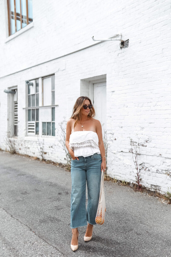 Perfect easy summer-ready cropped jeans outfit idea in Mavi Romee cropped jeans paired with a white crop top and nude Ted Baker pumps, styled by To Vogue or Bust.